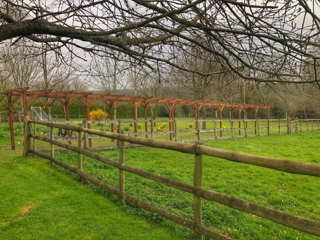 An example of 20 meter pergola, and surrounded by a view in the country side.