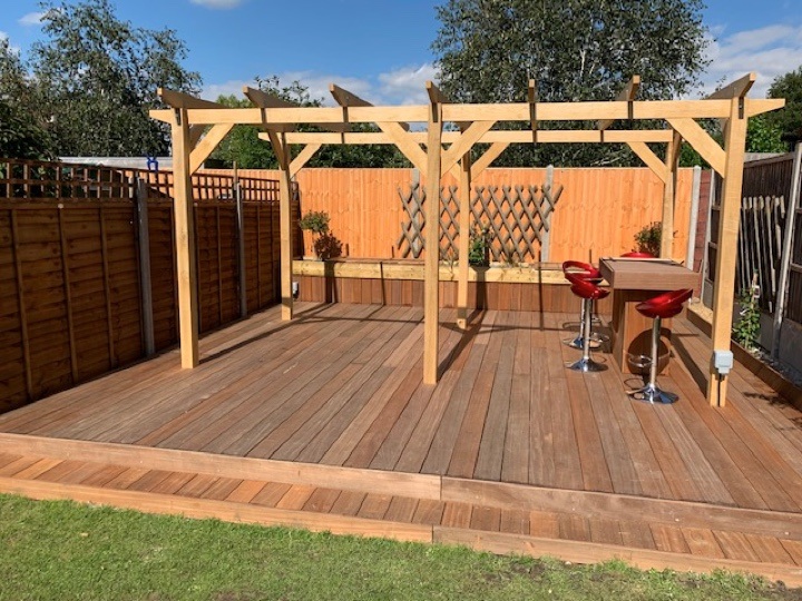 A customer example of module 5, stained with a dark wood stain, and built on a rough stone patio